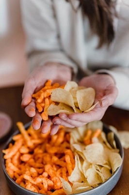 Woman holding chips