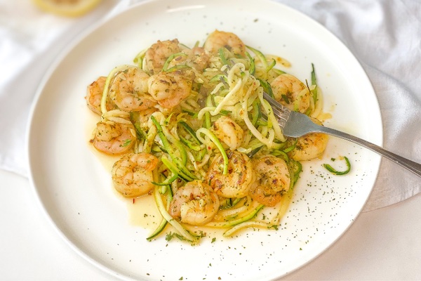 lazy keto shrimp scampi on a plate with a fork