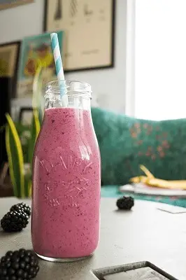 Keto smoothie in a jar made from blackberries