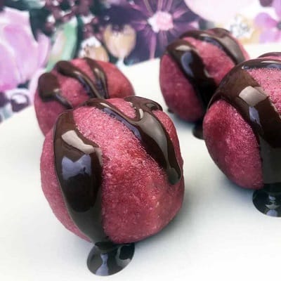 Keto chocolate drizzled marzipan pieces