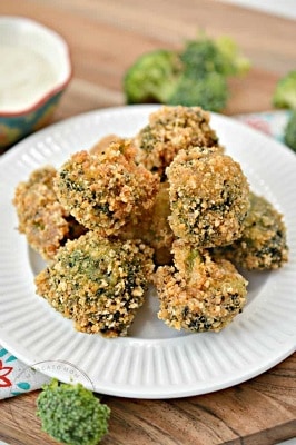Low carb garlic parmesan broccoli bites stacked on a plate