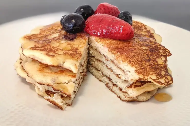keto cottage cheese pancakes with berries and syrup