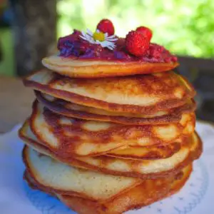 Keto ricotta pancakes on a white plate