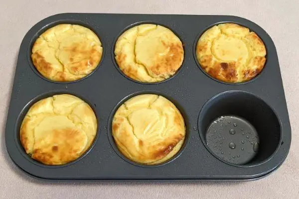mini keto cottage cheesecakes in muffin tin
