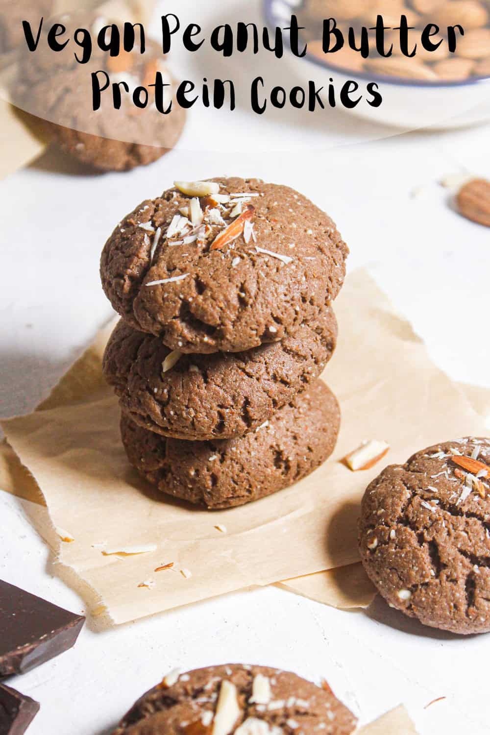 keto almond chocolate cookies stacked on baking paper